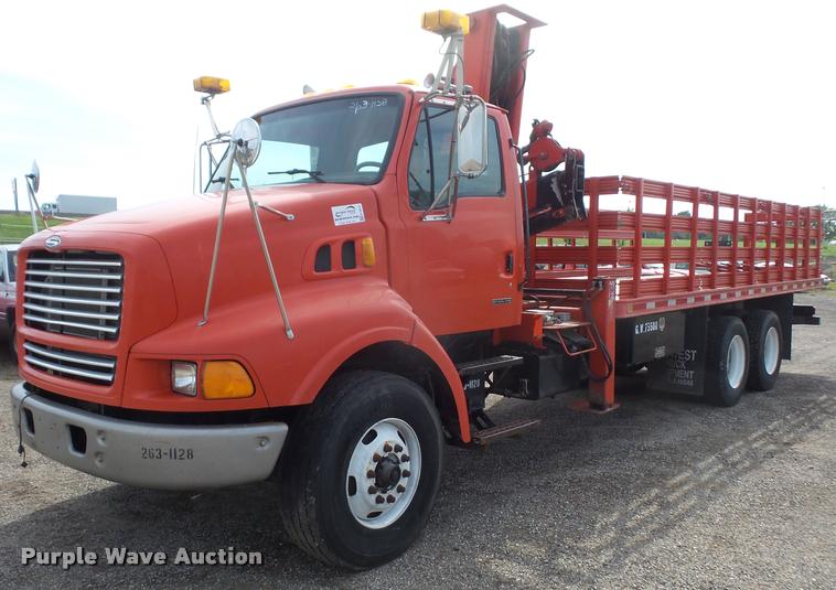 image for item K3670 1999 Sterling L9000 flatbed truck with crane