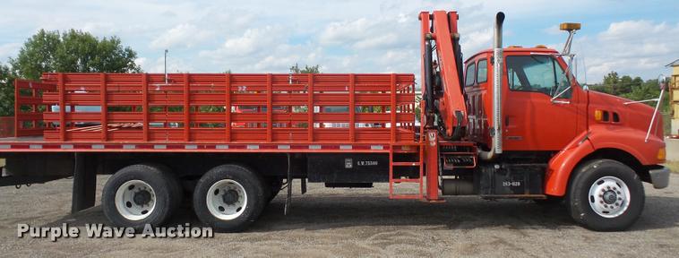 image for item K3670 1999 Sterling L9000 flatbed truck with crane