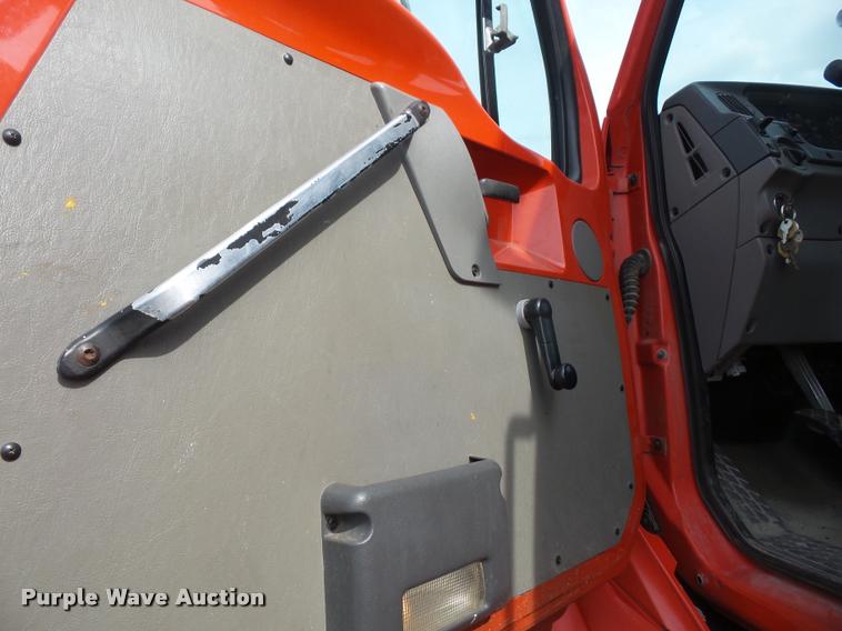 image for item K3670 1999 Sterling L9000 flatbed truck with crane