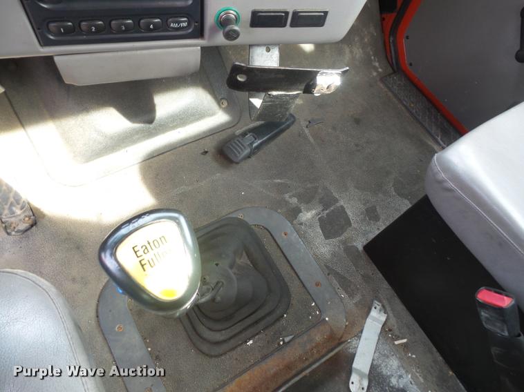 image for item K3670 1999 Sterling L9000 flatbed truck with crane