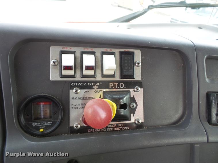 image for item K3670 1999 Sterling L9000 flatbed truck with crane