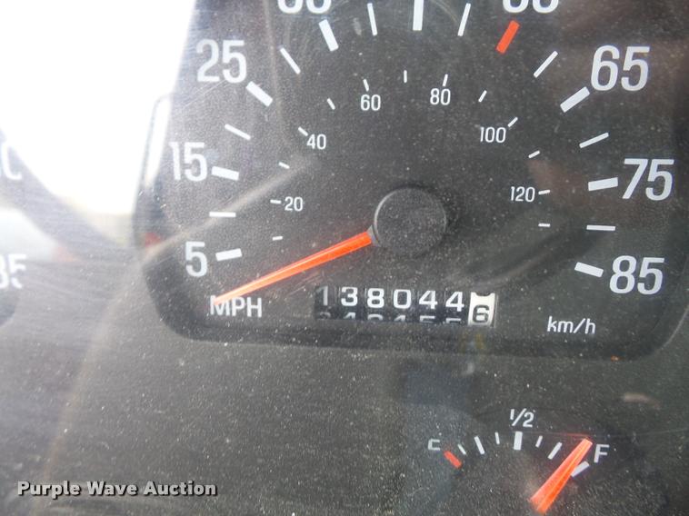 image for item K3670 1999 Sterling L9000 flatbed truck with crane