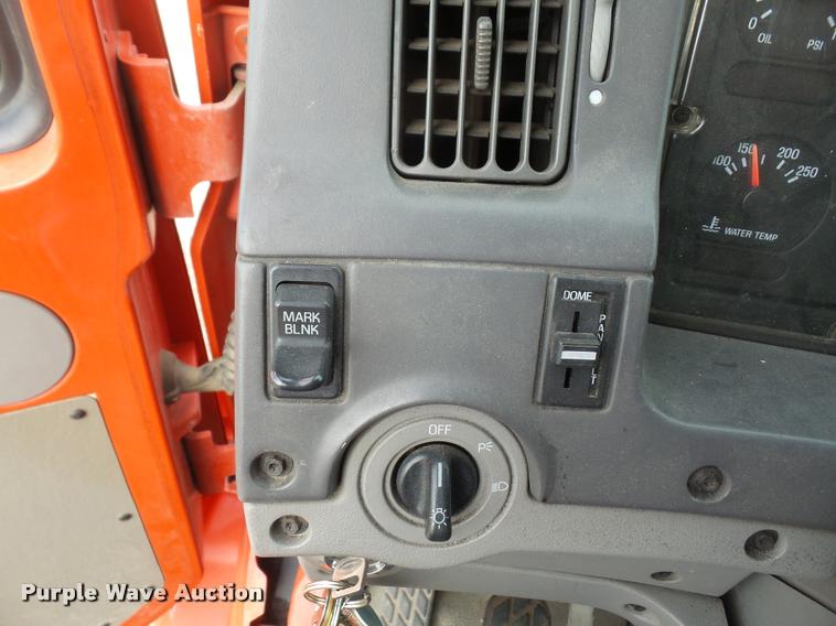 image for item K3670 1999 Sterling L9000 flatbed truck with crane