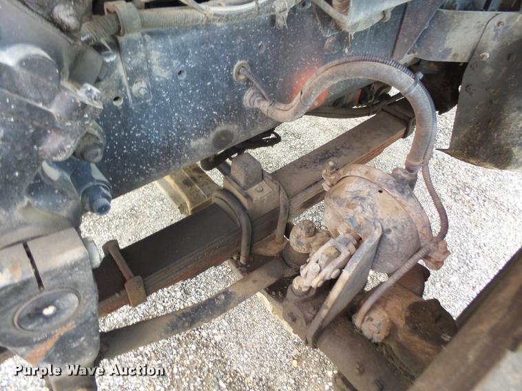 image for item K3670 1999 Sterling L9000 flatbed truck with crane