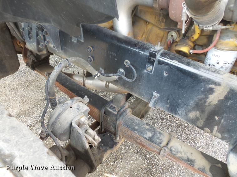 image for item K3670 1999 Sterling L9000 flatbed truck with crane