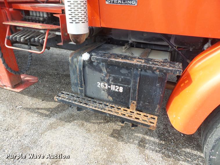 image for item K3670 1999 Sterling L9000 flatbed truck with crane