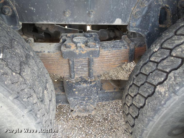 image for item K3670 1999 Sterling L9000 flatbed truck with crane