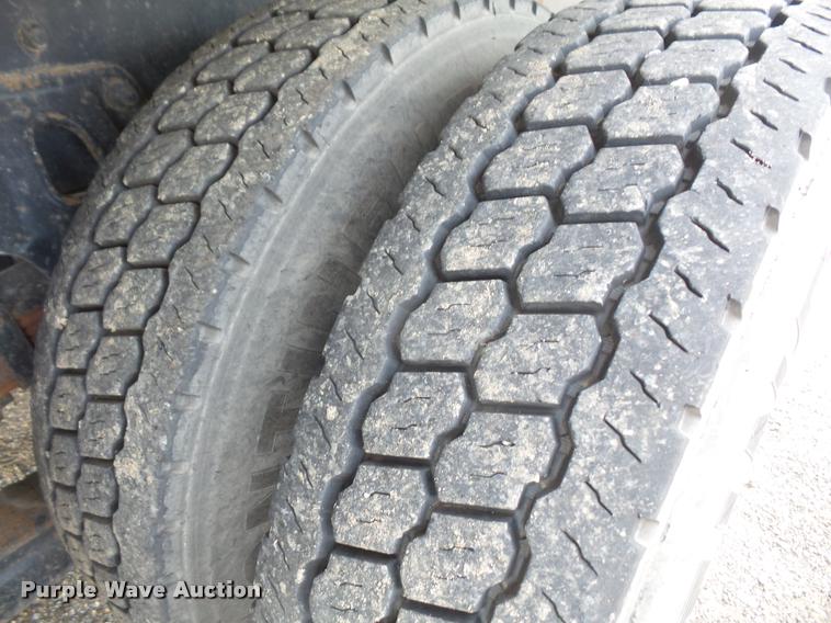 image for item K3670 1999 Sterling L9000 flatbed truck with crane