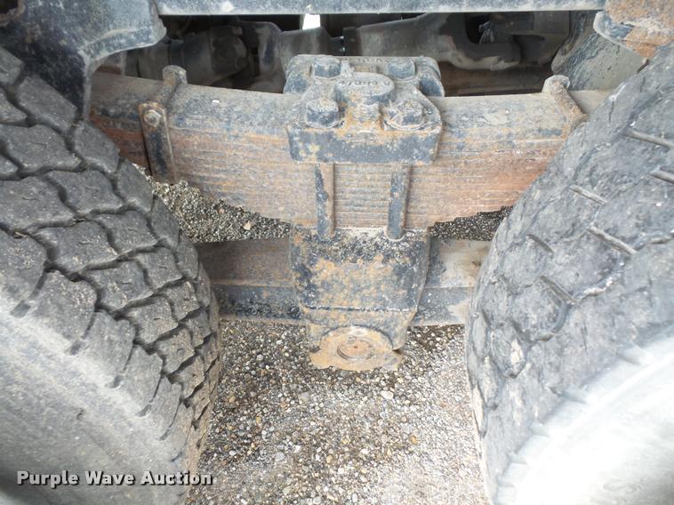 image for item K3670 1999 Sterling L9000 flatbed truck with crane