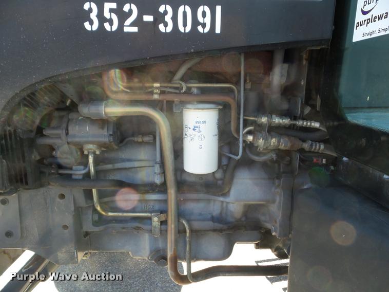 image for item L1638 2001 Ford TS100 tractor