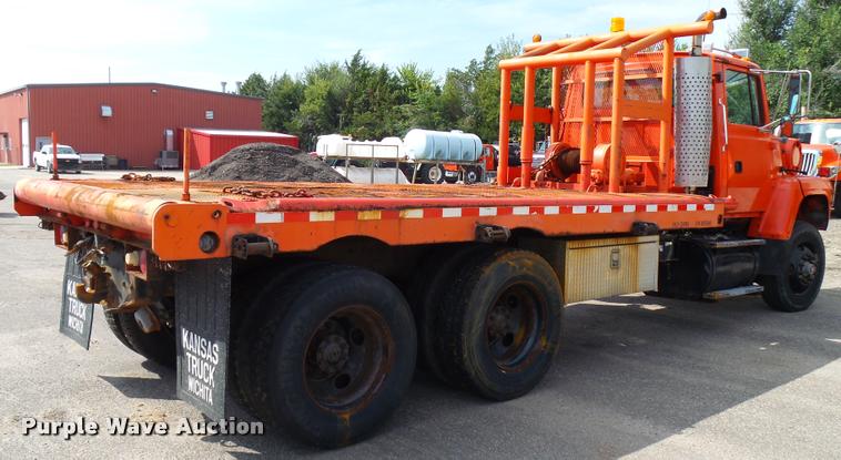 image for item L2674 1997 Ford LNT9000 flatbed truck