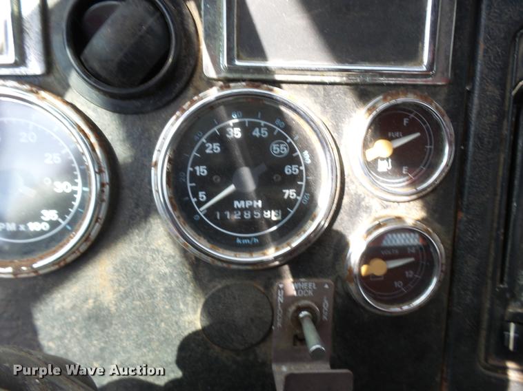 image for item L2674 1997 Ford LNT9000 flatbed truck