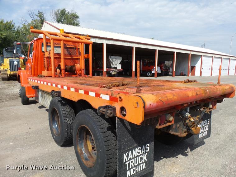 image for item L2674 1997 Ford LNT9000 flatbed truck
