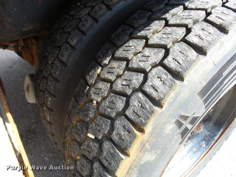 image for item L2674 1997 Ford LNT9000 flatbed truck