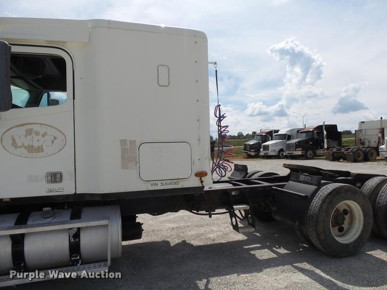 image for item K1135 2003 Freightliner ST120 semi truck