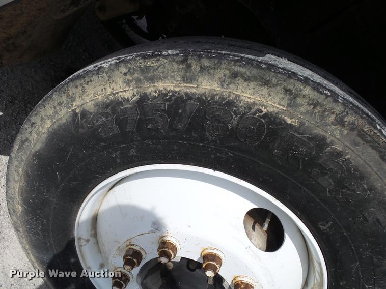 image for item K1135 2003 Freightliner ST120 semi truck