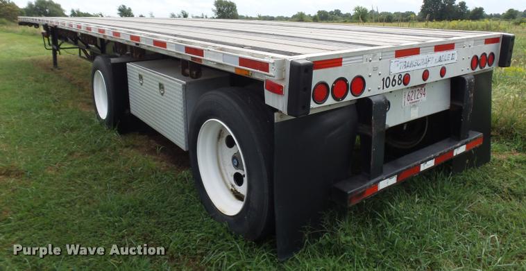 image for item K1976 2003 Transcraft Eagle II flatbed trailer
