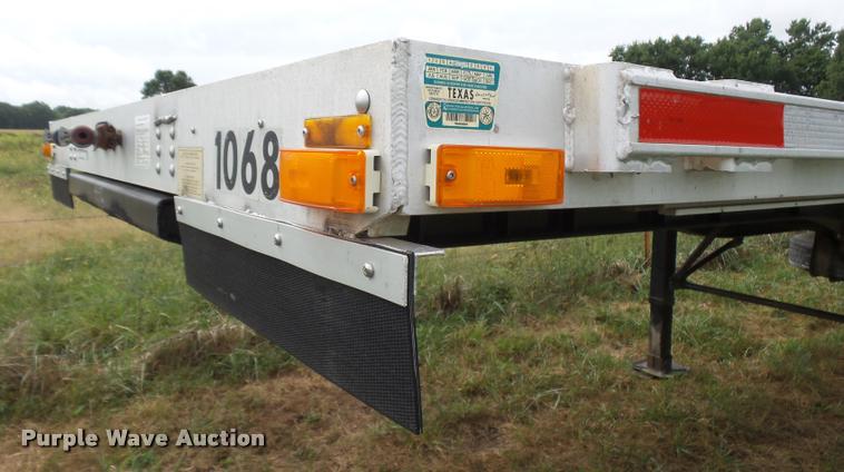 image for item K1976 2003 Transcraft Eagle II flatbed trailer
