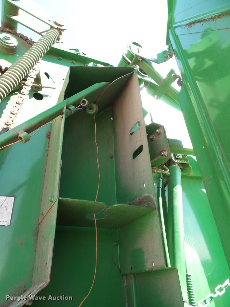 image for item J4759 2009 John Deere 568  Mega Wide Plus round baler