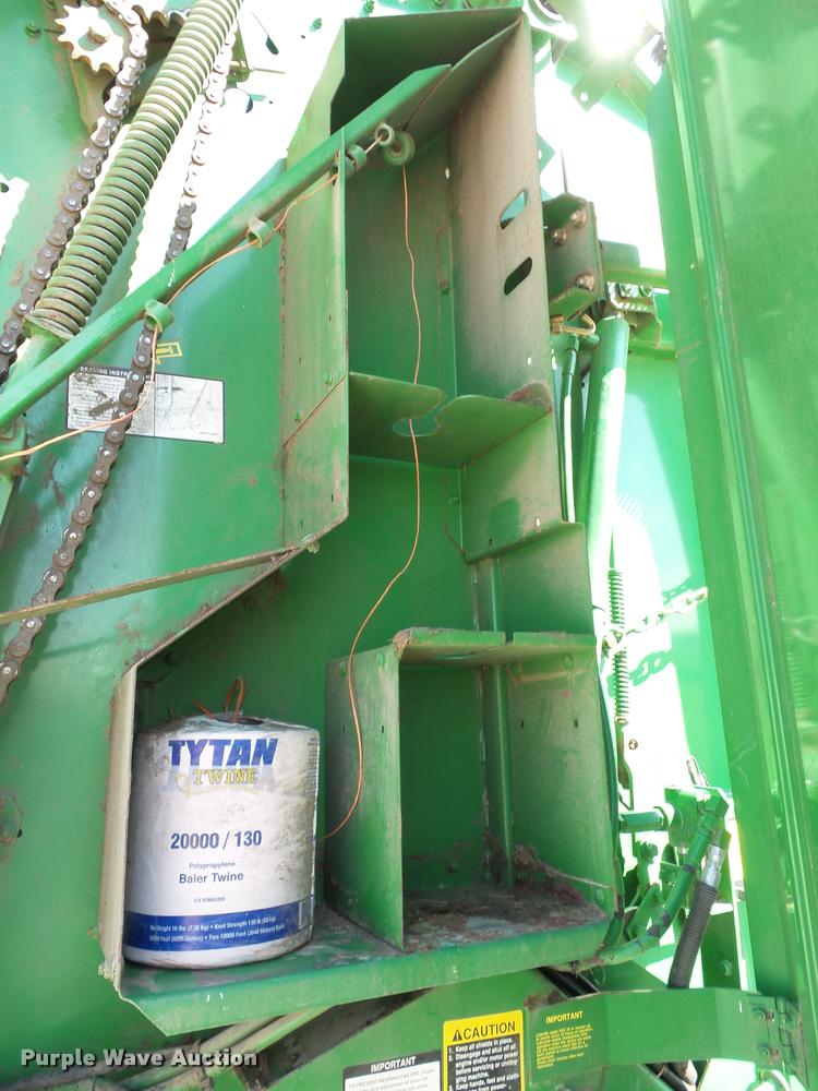 image for item J4759 2009 John Deere 568  Mega Wide Plus round baler