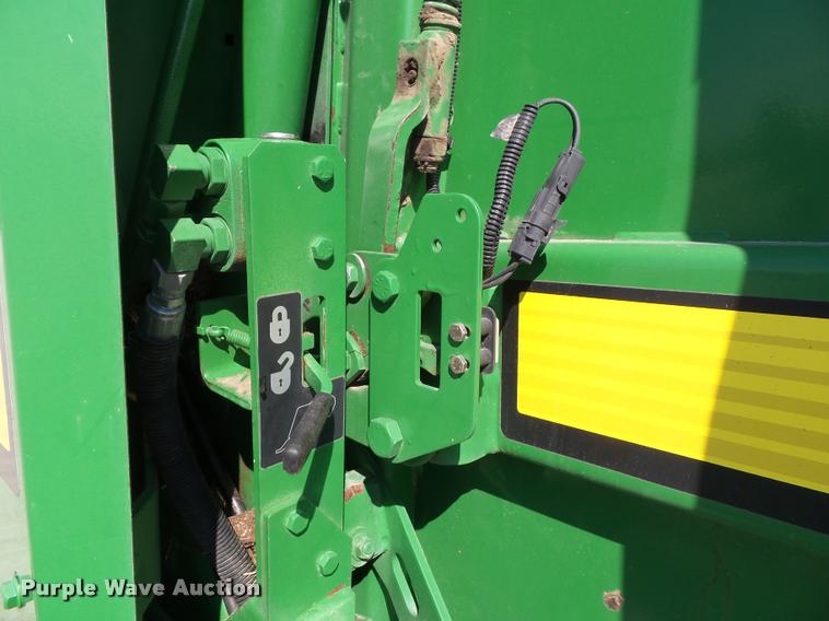 image for item J4759 2009 John Deere 568  Mega Wide Plus round baler