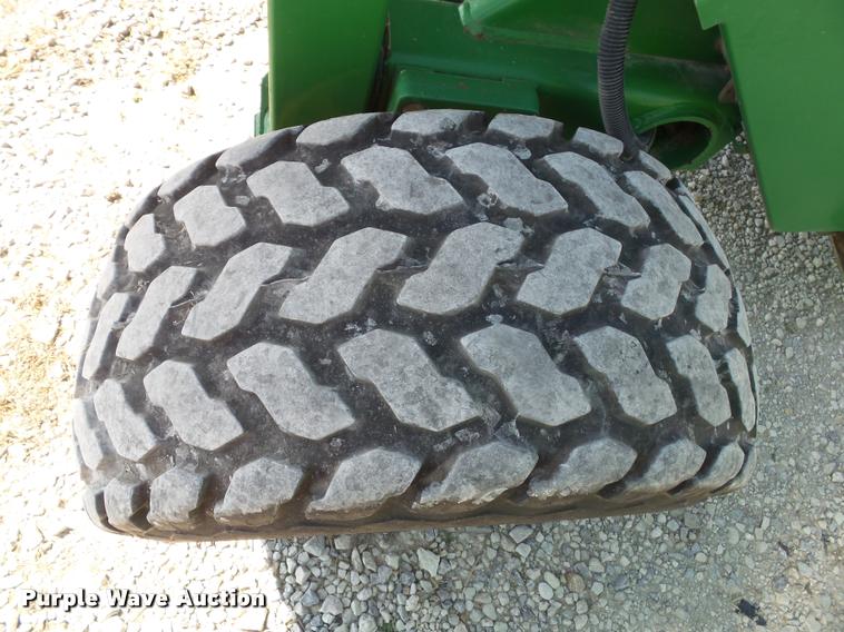 image for item J4759 2009 John Deere 568  Mega Wide Plus round baler