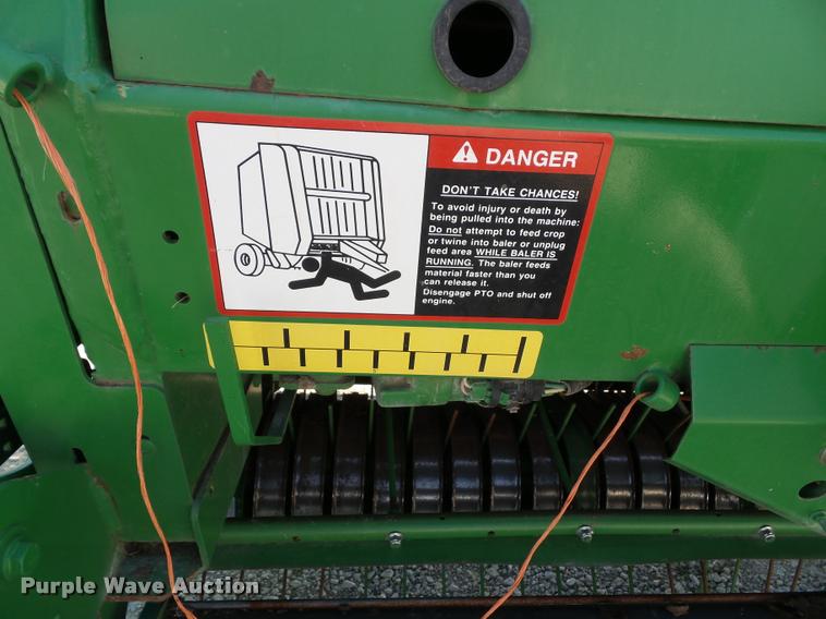 image for item J4759 2009 John Deere 568  Mega Wide Plus round baler