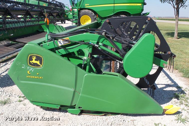 image for item J4763 2004 John Deere 630F Hydra flex head