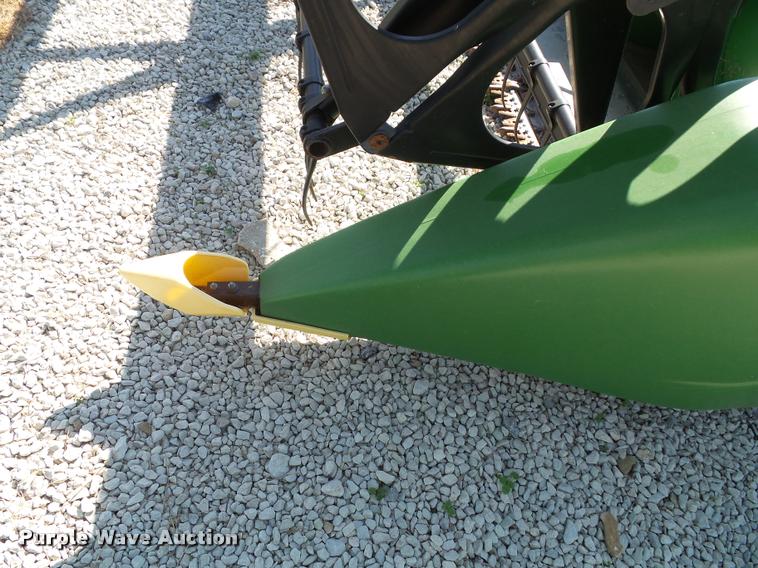 image for item J4763 2004 John Deere 630F Hydra flex head