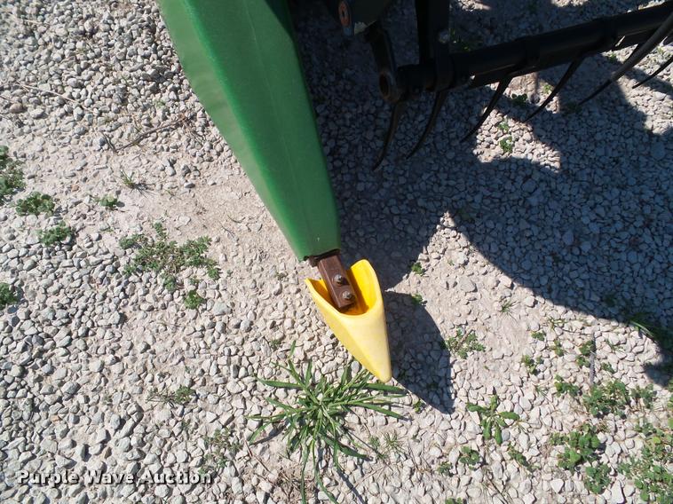 image for item J4763 2004 John Deere 630F Hydra flex head