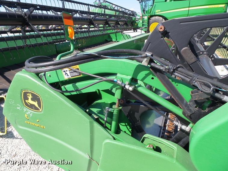 image for item J4763 2004 John Deere 630F Hydra flex head