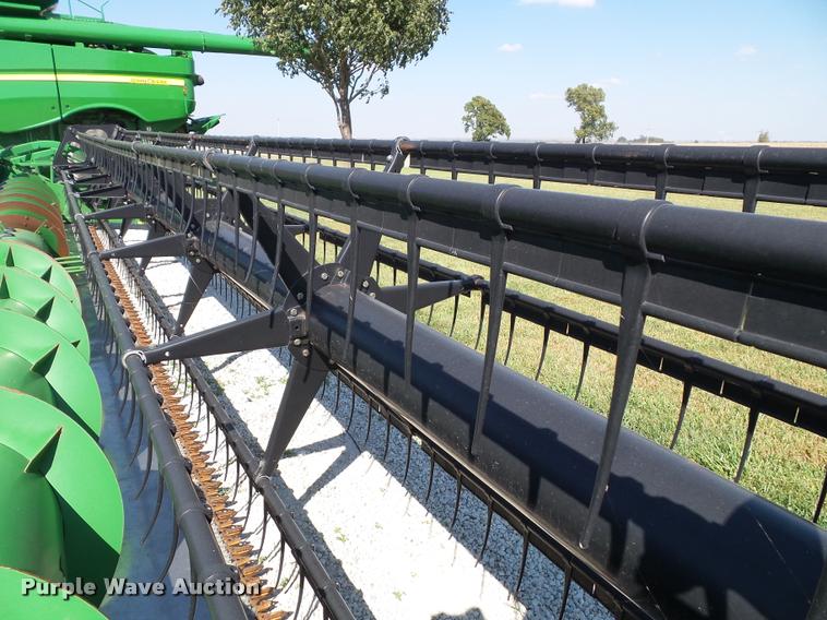 image for item J4763 2004 John Deere 630F Hydra flex head