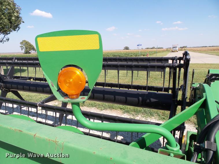 image for item J4763 2004 John Deere 630F Hydra flex head