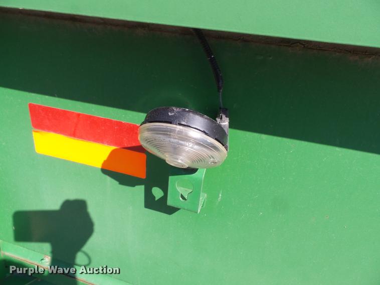 image for item J4763 2004 John Deere 630F Hydra flex head