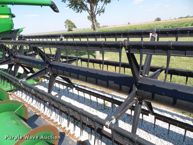 image for item J4763 2004 John Deere 630F Hydra flex head