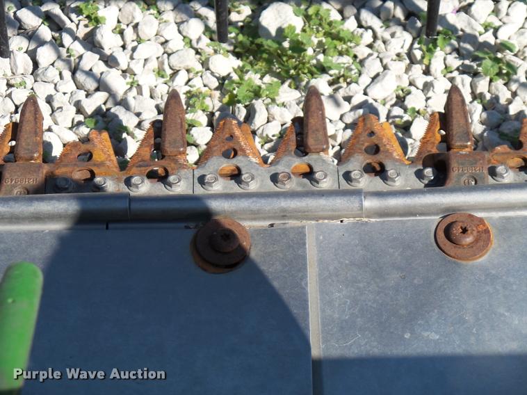 image for item J4763 2004 John Deere 630F Hydra flex head