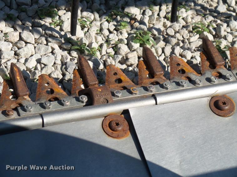 image for item J4763 2004 John Deere 630F Hydra flex head