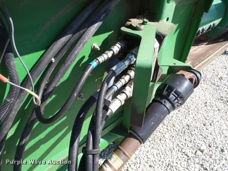 image for item J4763 2004 John Deere 630F Hydra flex head