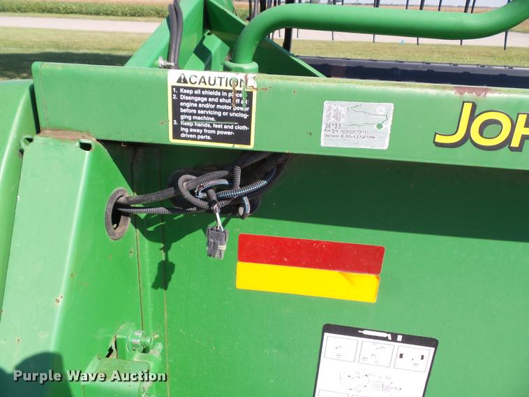 image for item J4763 2004 John Deere 630F Hydra flex head
