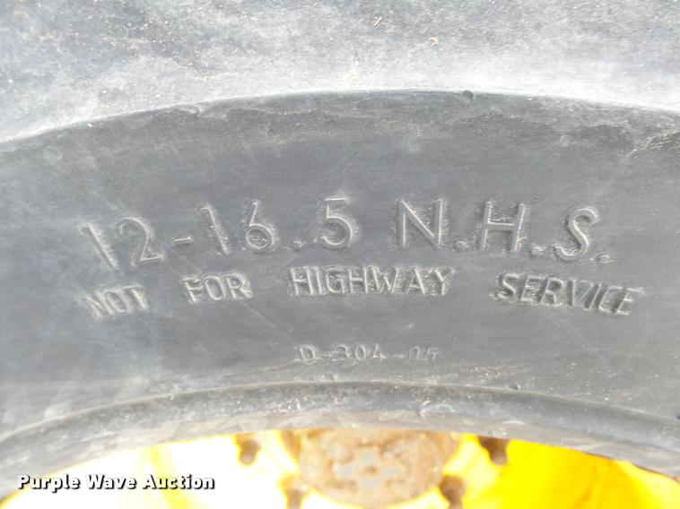 image for item K1094 2011 New Holland L225 skid steer