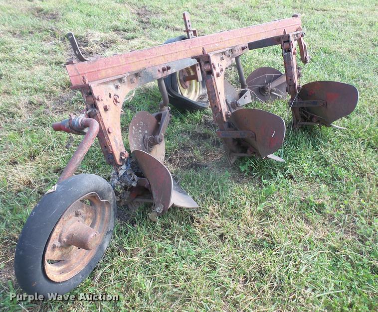 image for item K3701 Mccormick Farmall three bottom plow