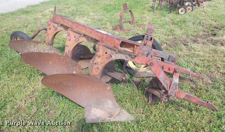 image for item K3701 Mccormick Farmall three bottom plow