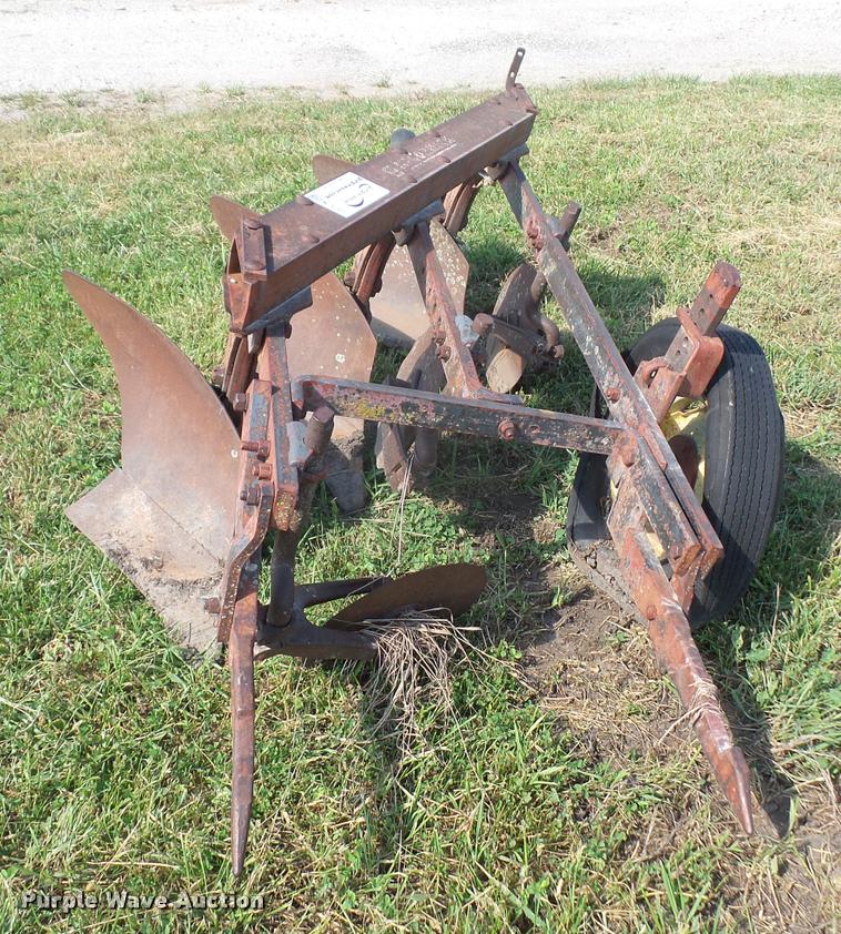image for item K3701 Mccormick Farmall three bottom plow