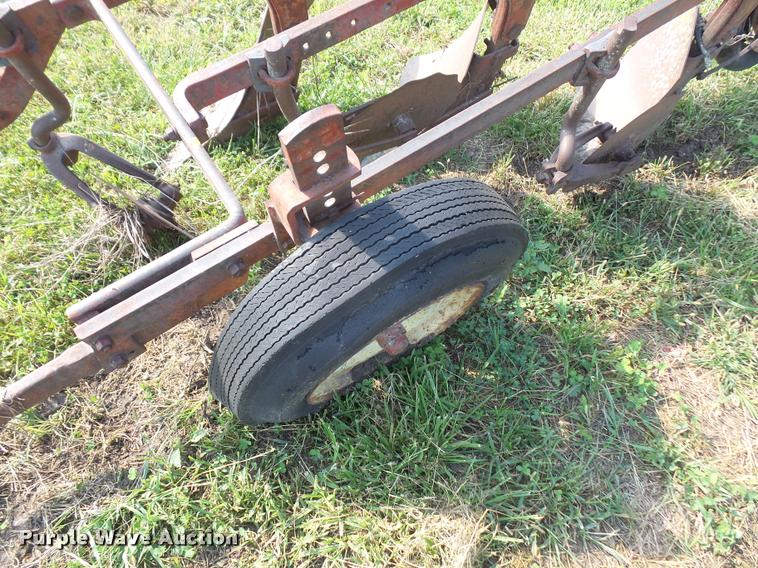 image for item K3701 Mccormick Farmall three bottom plow