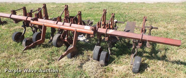 image for item K3702 Farmall four row cultivator