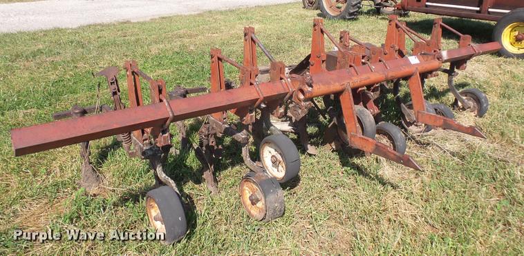 image for item K3702 Farmall four row cultivator