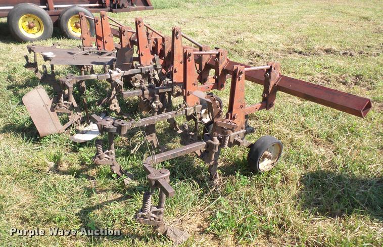 image for item K3702 Farmall four row cultivator