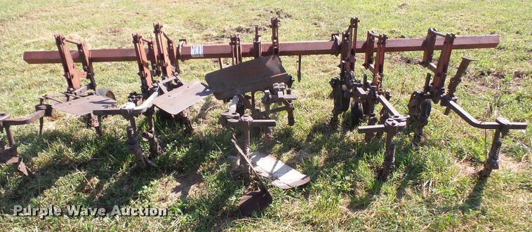 image for item K3702 Farmall four row cultivator