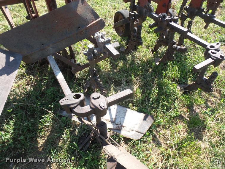 image for item K3702 Farmall four row cultivator