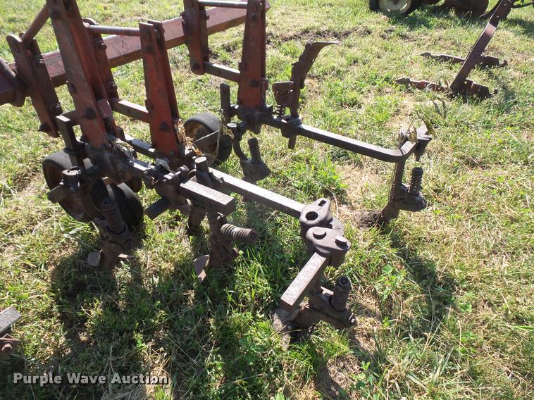 image for item K3702 Farmall four row cultivator